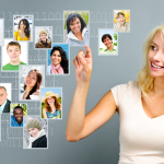 Women standing next to photos of individuals in her network